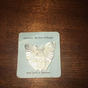 Hand carved vintage mother of pearl brooch